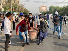 Scores arrested as Myanmar police disperse anti-coup rally