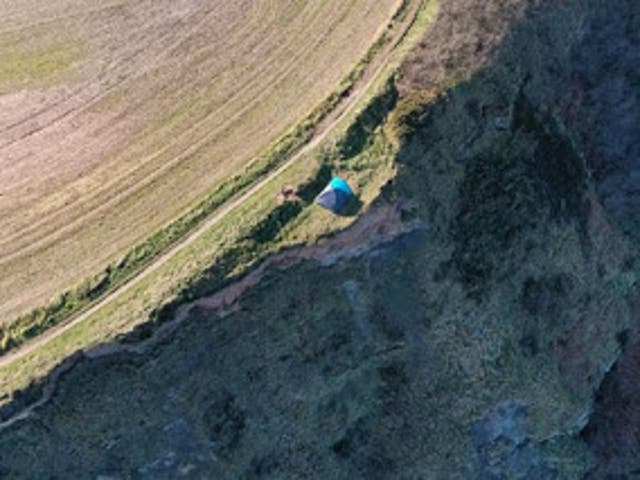 <p>A family with a child was seen camping dangerously close to a cliff edge on Cleveland Way, North Yorkshire, on 27 February</p>