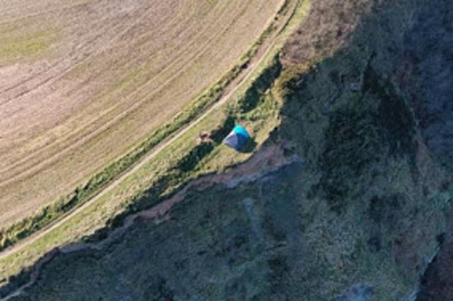 <p>A family with a child was seen camping dangerously close to a cliff edge on Cleveland Way, North Yorkshire, on 27 February</p>