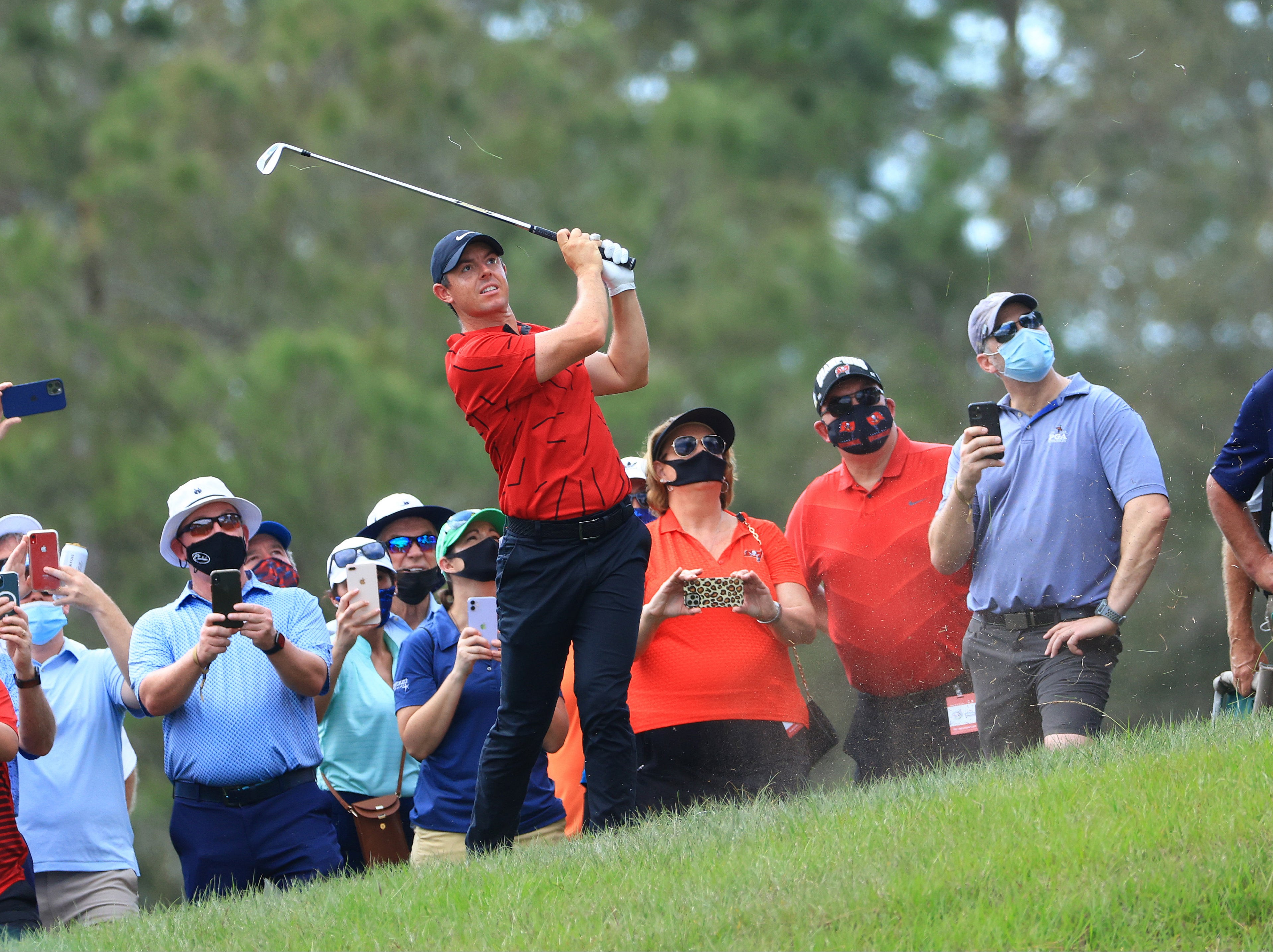 Rory McIlroy plays an approach shot at The Concession in Florida