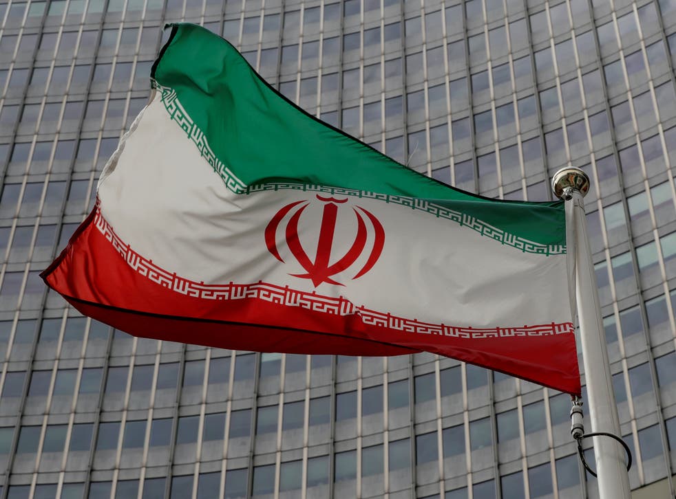 <p>An Iranian flag at the International Atomic Energy Agency (IAEA) headquarters in Vienna, Austria</p>