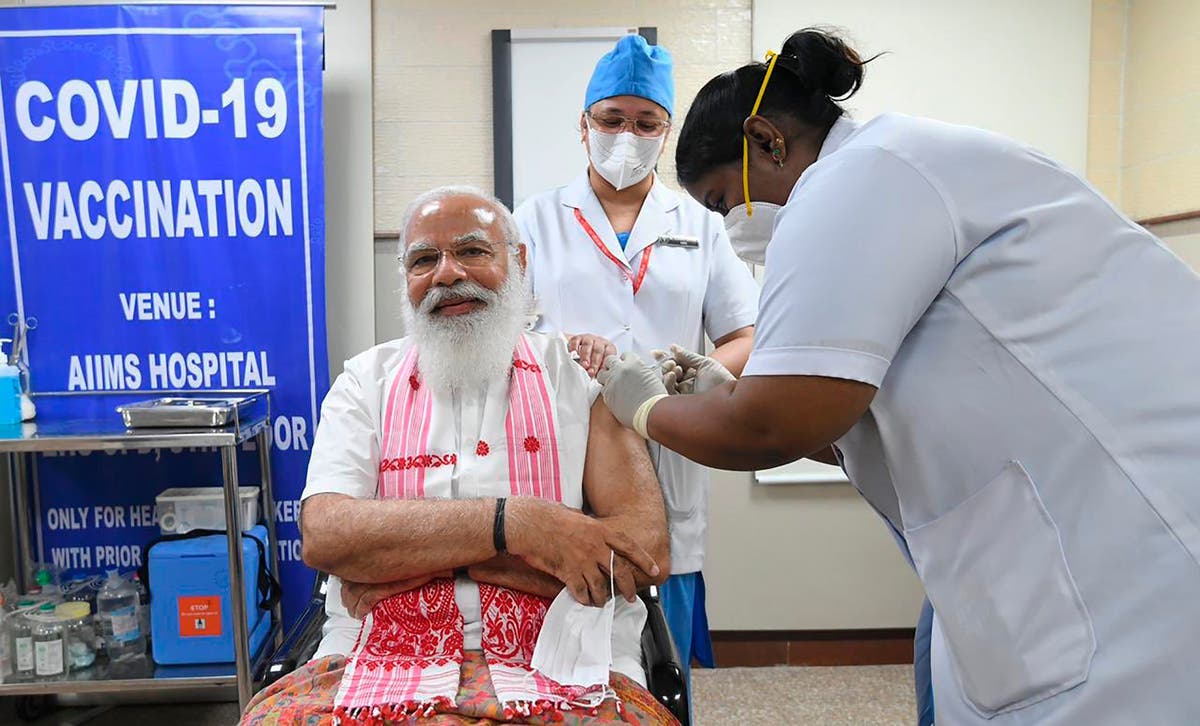 India giving COVID-19 vaccines to more people as cases rise