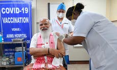 India giving COVID-19 vaccines to more people as cases rise