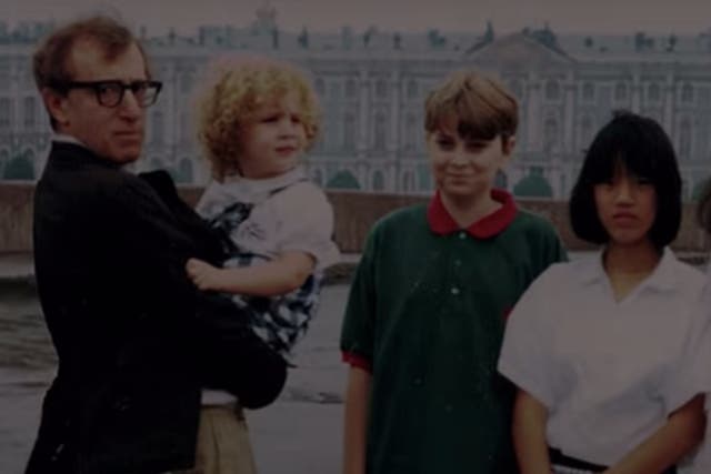 <p>An old photograph of Woody Allen is holding young Dylan Farrow featured in the teaser of HBO’s documentary </p>