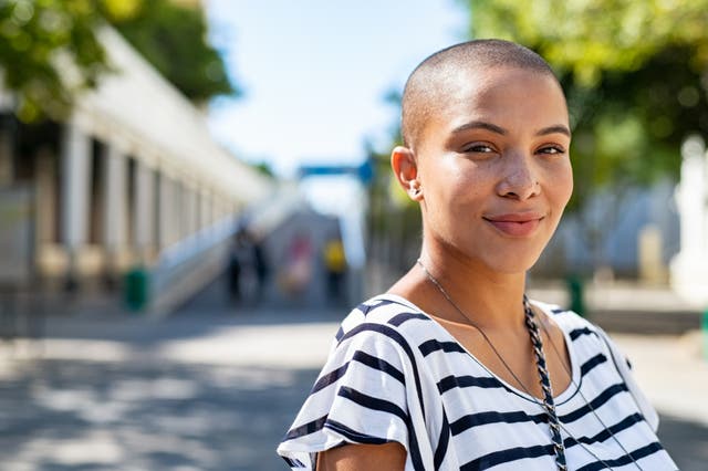 Portrait photo of a young woman looking vibrant and well