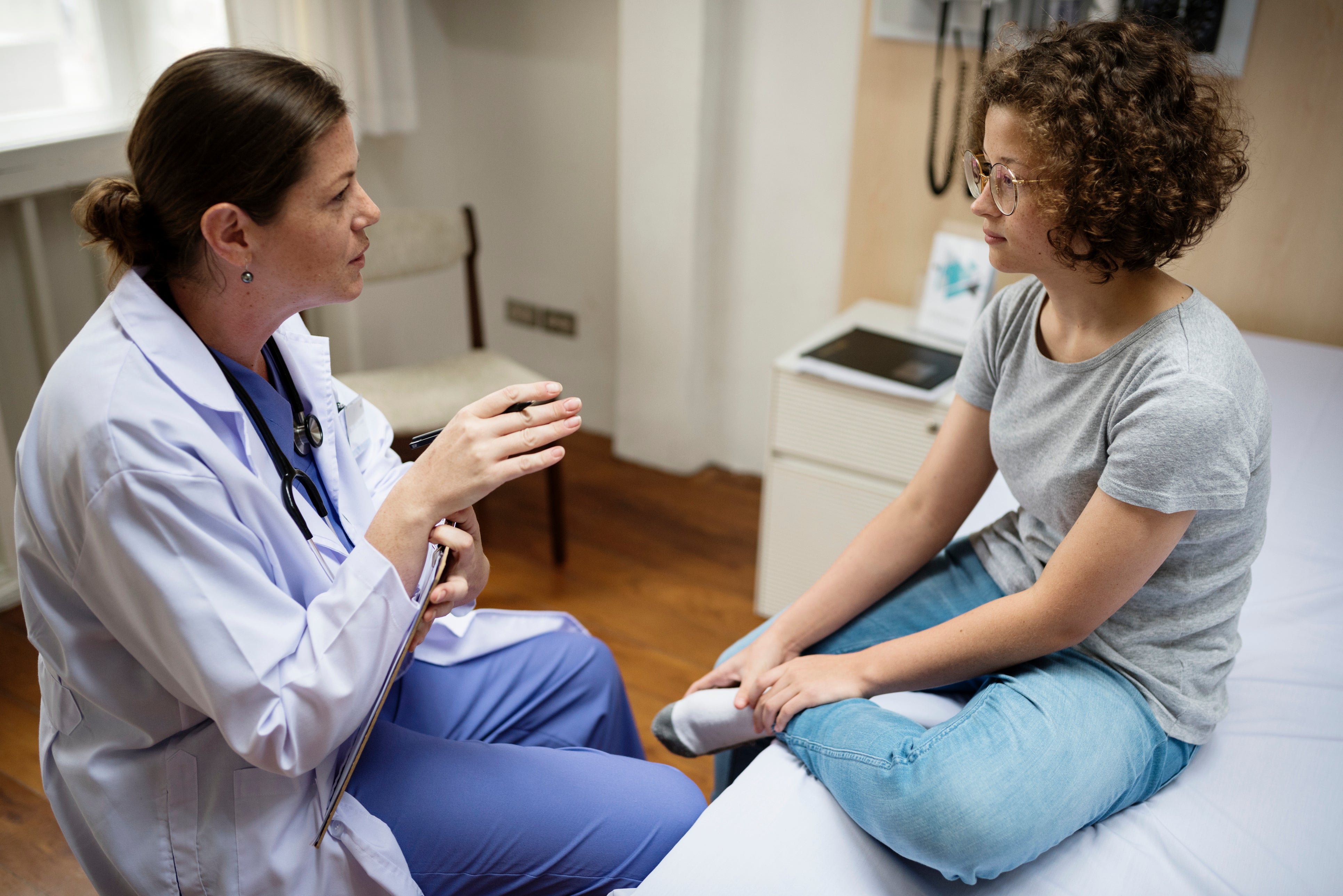 Young woman having a hospital appointment with a consultant