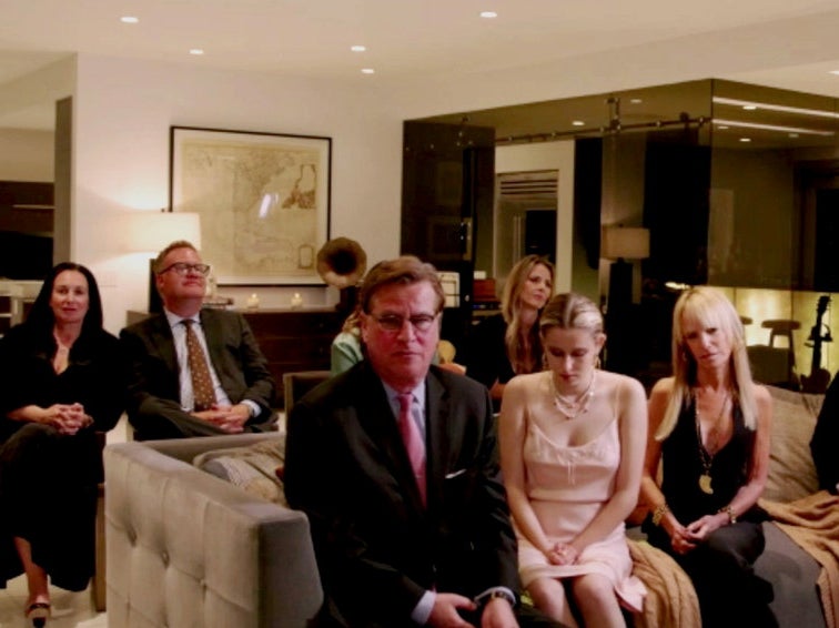 Aaron Sorkin (centre) sits with his family during the Golden Globes ceremony