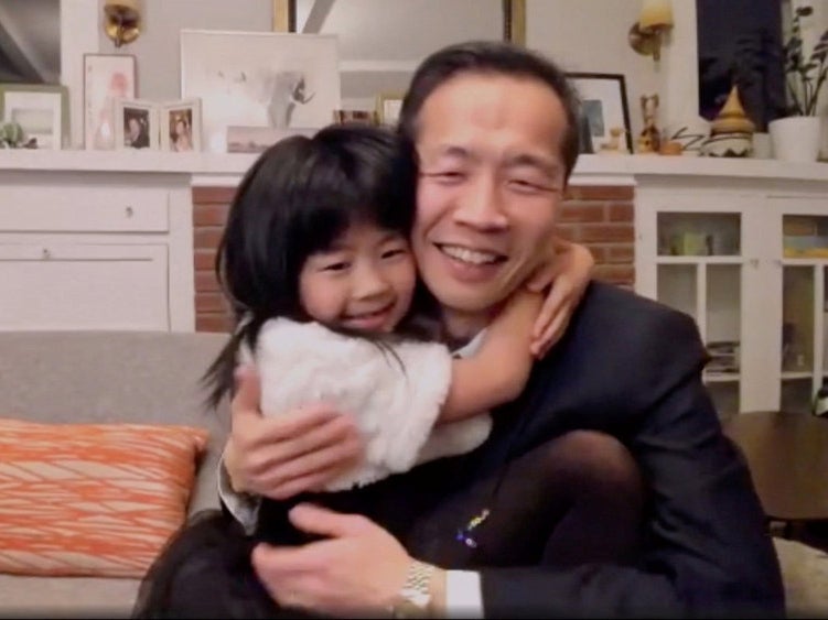 Lee Isaac Chung celebrates with his daughter after winning Best Motion Picture - Foreign Language for Minari