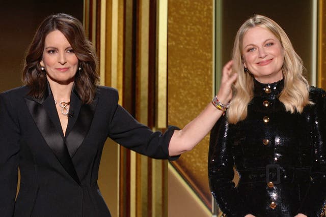 A human touch: Tina Fey and Amy Poehler digitally co-hosting the Golden Globes last night