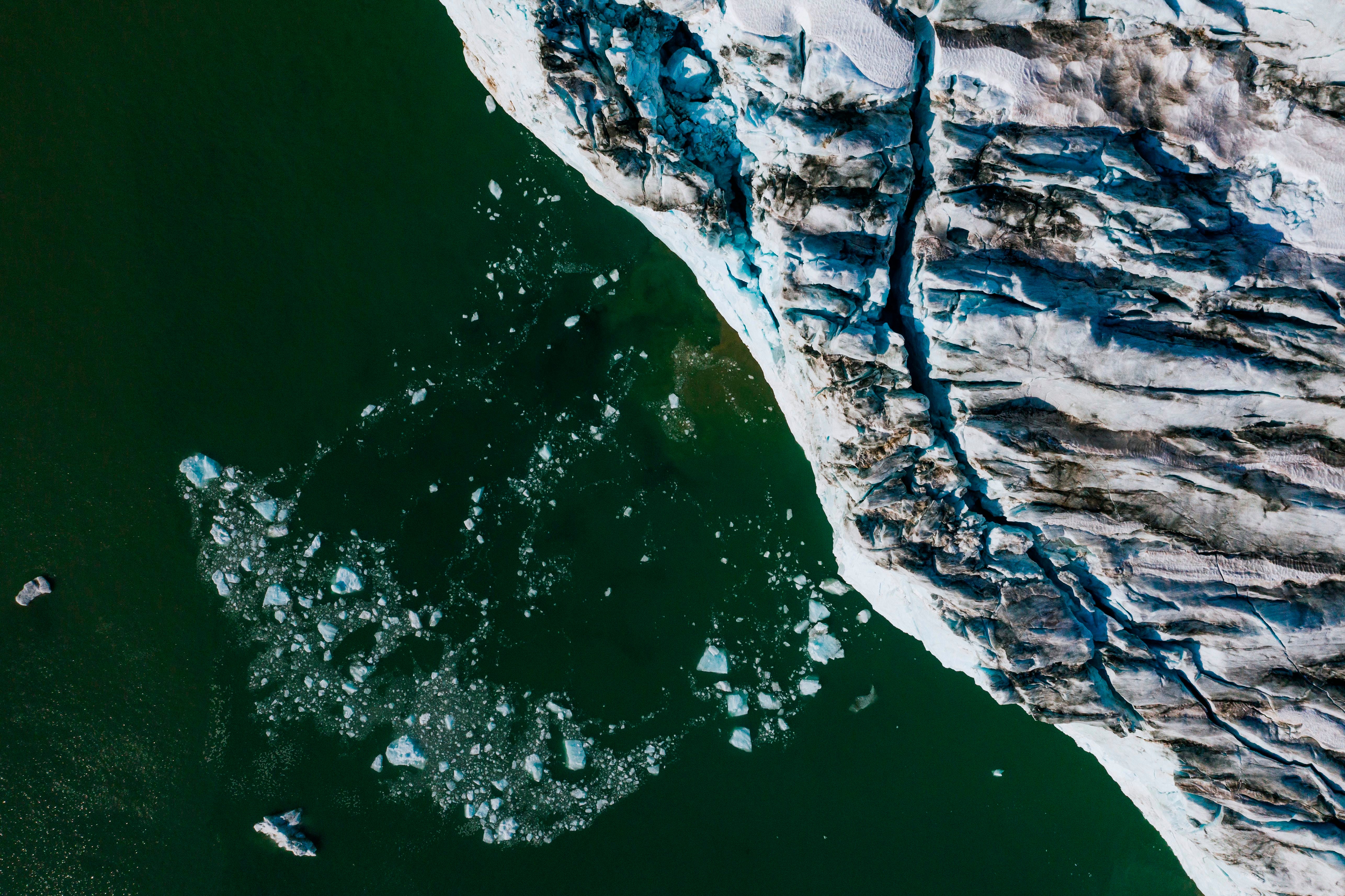 An aerial picture shows bergy bits and growlers floating in front of the Apusiajik glacier, near Kulusuk, on the southeastern shore of Greenland