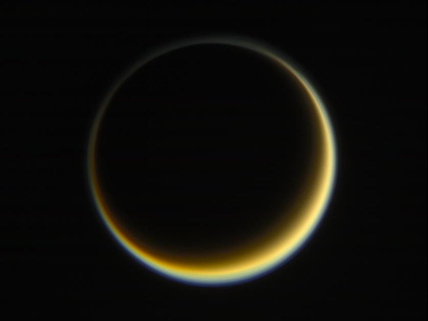The night side of Saturn’s moon Titan as viewed from Nasa’s Cassini spacecraft, highlighting the extended, hazy nature of the moon’s atmosphere