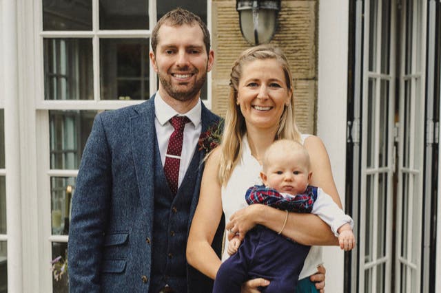 <p>Laura Ellis and husband James, pictured with their baby son Josh  who was born after the death of their first child, Theo, following mistakes at Frimley Park Hospital</p>