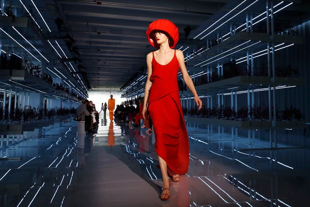 A model wears a creation as part of the Daniel Del Core women's and men's Fall Winter 2021-22 collection, unveiled during the Fashion Week