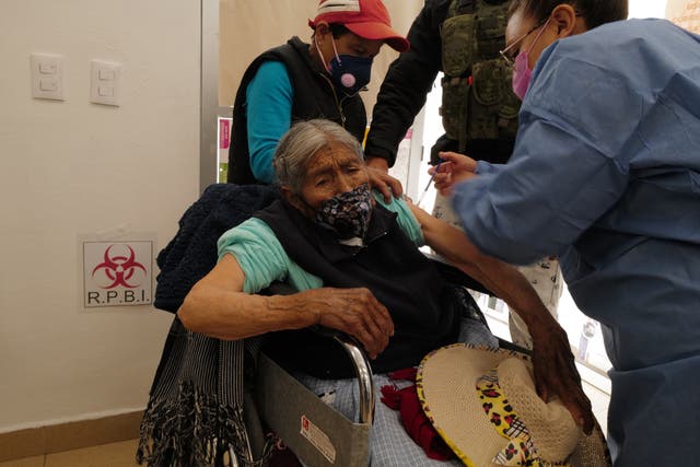 <p>Dominga Orozco Quijano, 100, receives her vaccine </p>