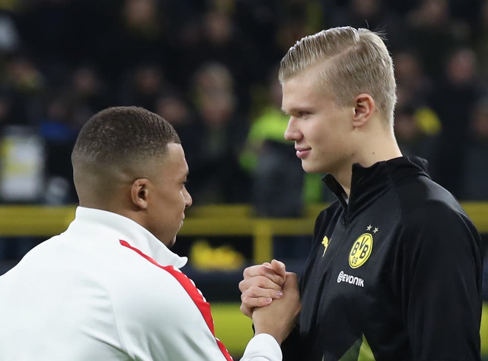 PSG’s Kylian Mbappe (left) and Borussia Dortmund’s Erling Haaland