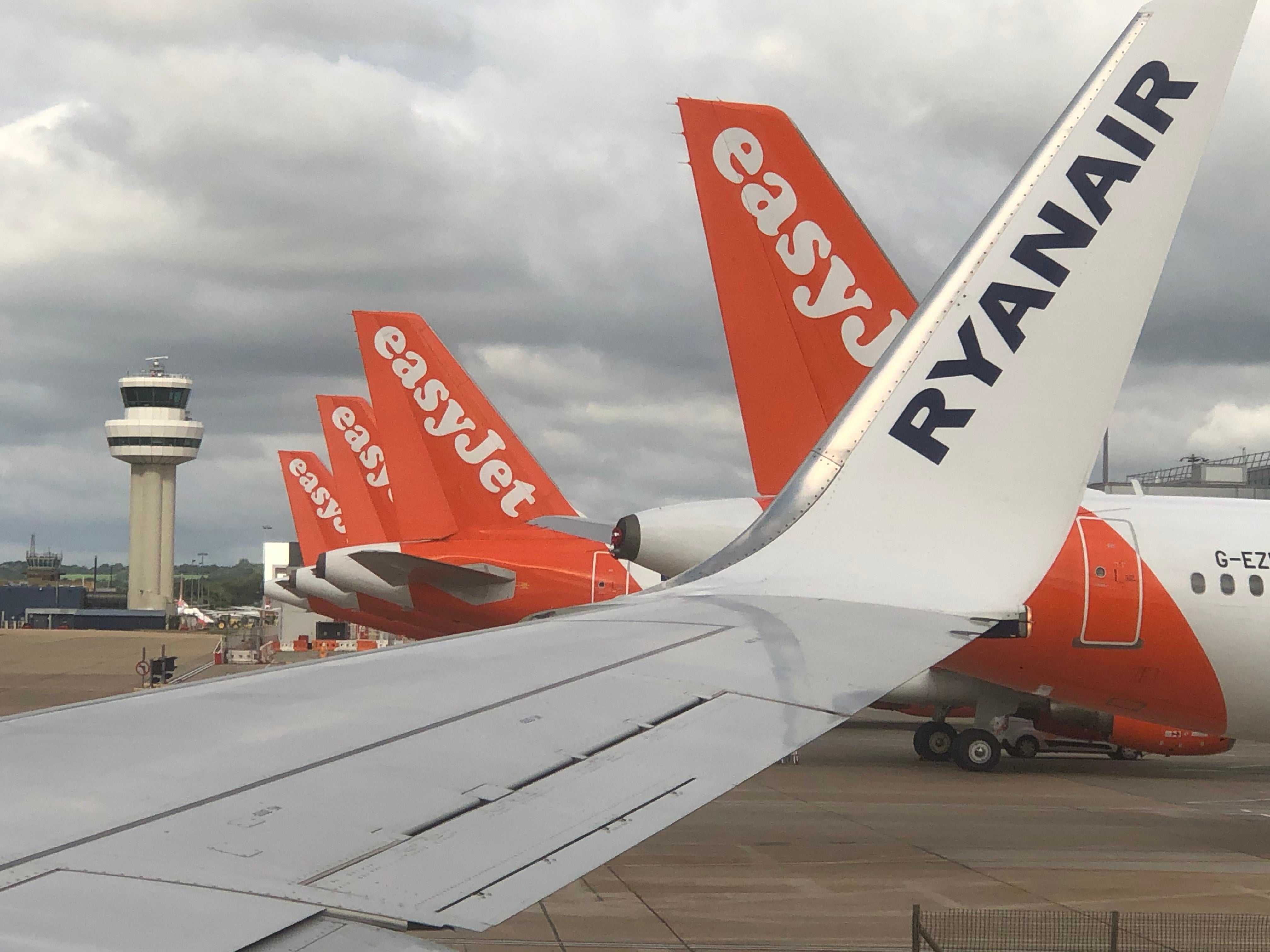 Safe bets: the view from a Ryanair plane of easyJet tailfins at Gatwick airport
