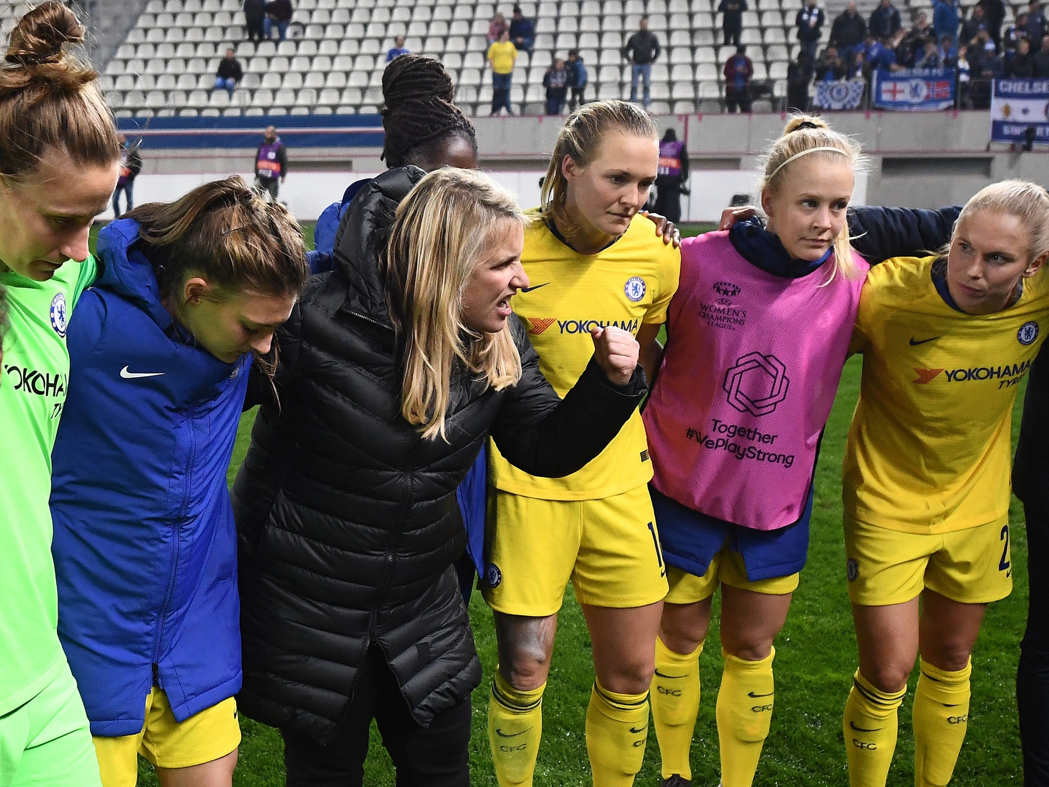 Chelsea Women coach Emma Hayes (centre left) with her players
