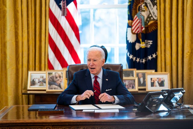 <p>WASHINGTON, DC - JANUARY 28: U.S. President Joe Biden signs executive actions in the Oval Office of the White House on January 28, 2021 in Washington, DC. </p>