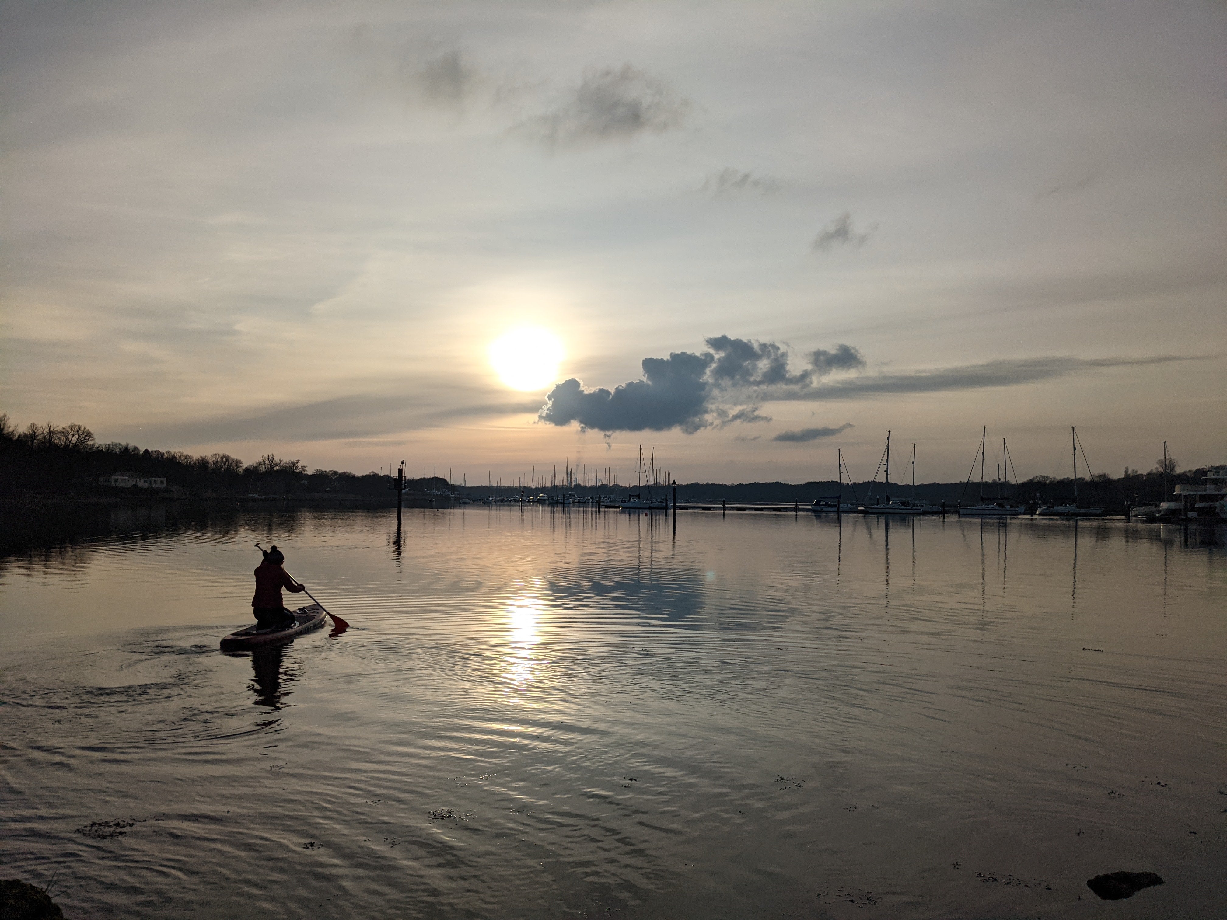Paddleboarding is the perfect ice breaker as strangers talk to you when you prep to SUP
