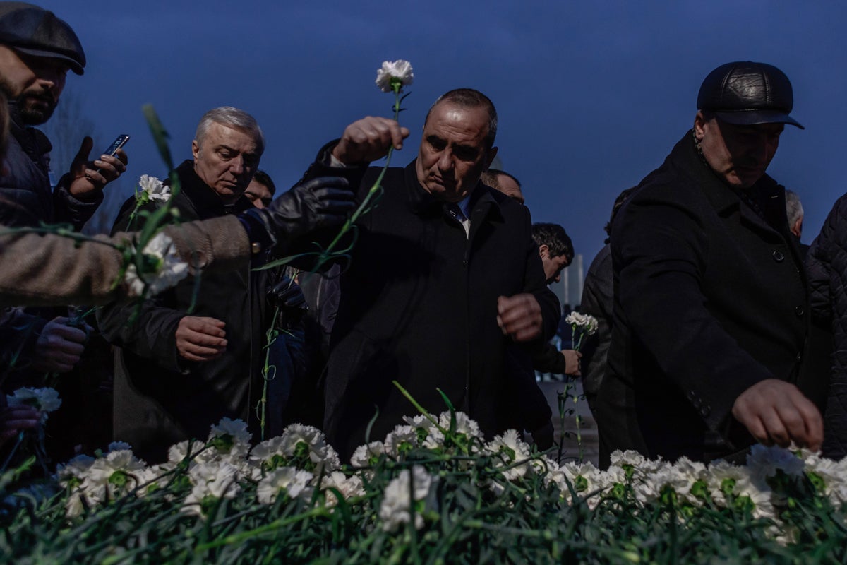Relatives lay flowers at the cemetery in Yerevan every day where hundreds come at sunset for ceremonies that last for a few hours to pay tribute to the fallen in the war