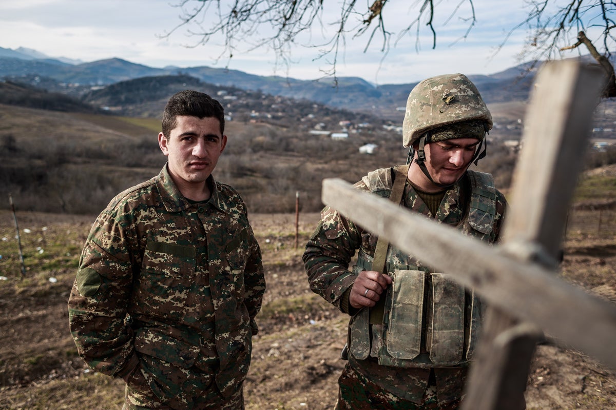 Soldier Hamlet (R) and a comrade next to a trench near the eastern city of Martuni