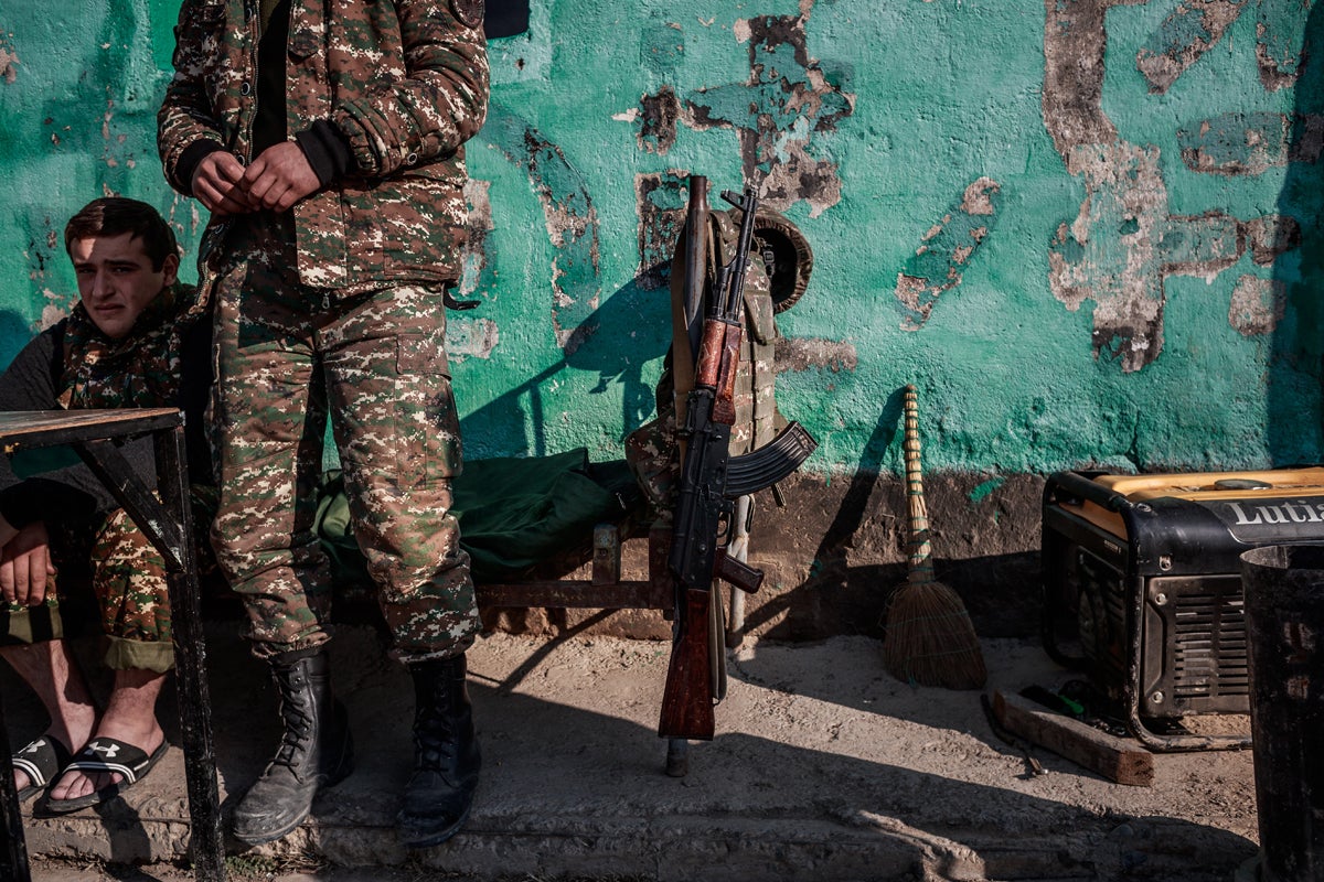 Armenian soldiers wait at a military control point in a north-eastern city, Martakert, in the self-proclaimed Nagorno-Karabakh Republic. Morale is low and in some of the military positions the traditional hard discipline has now relaxed
