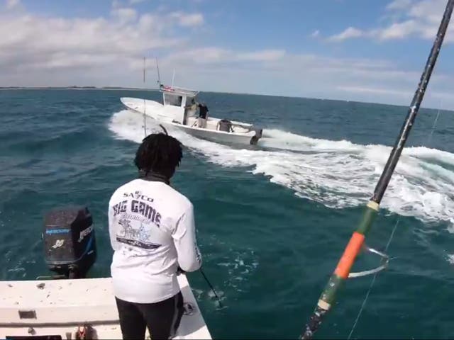 <p>Video shows a Black fisherman verbally abused by men aboard another boat</p>