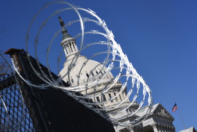A barbed wire-topped fence has surrounded the Capitol since the insurrection in January.