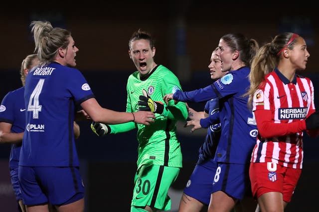 Ann-Katrin Berger celebrates saving a penalty