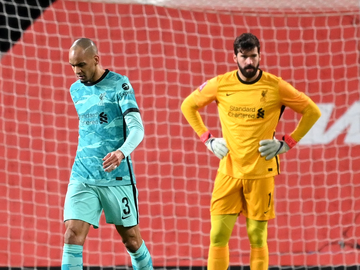 Liverpool players Fabinho and Alisson