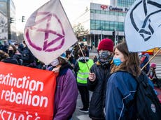 Extinction Rebellion protester arrested after climbing onto roof of Scottish parliament