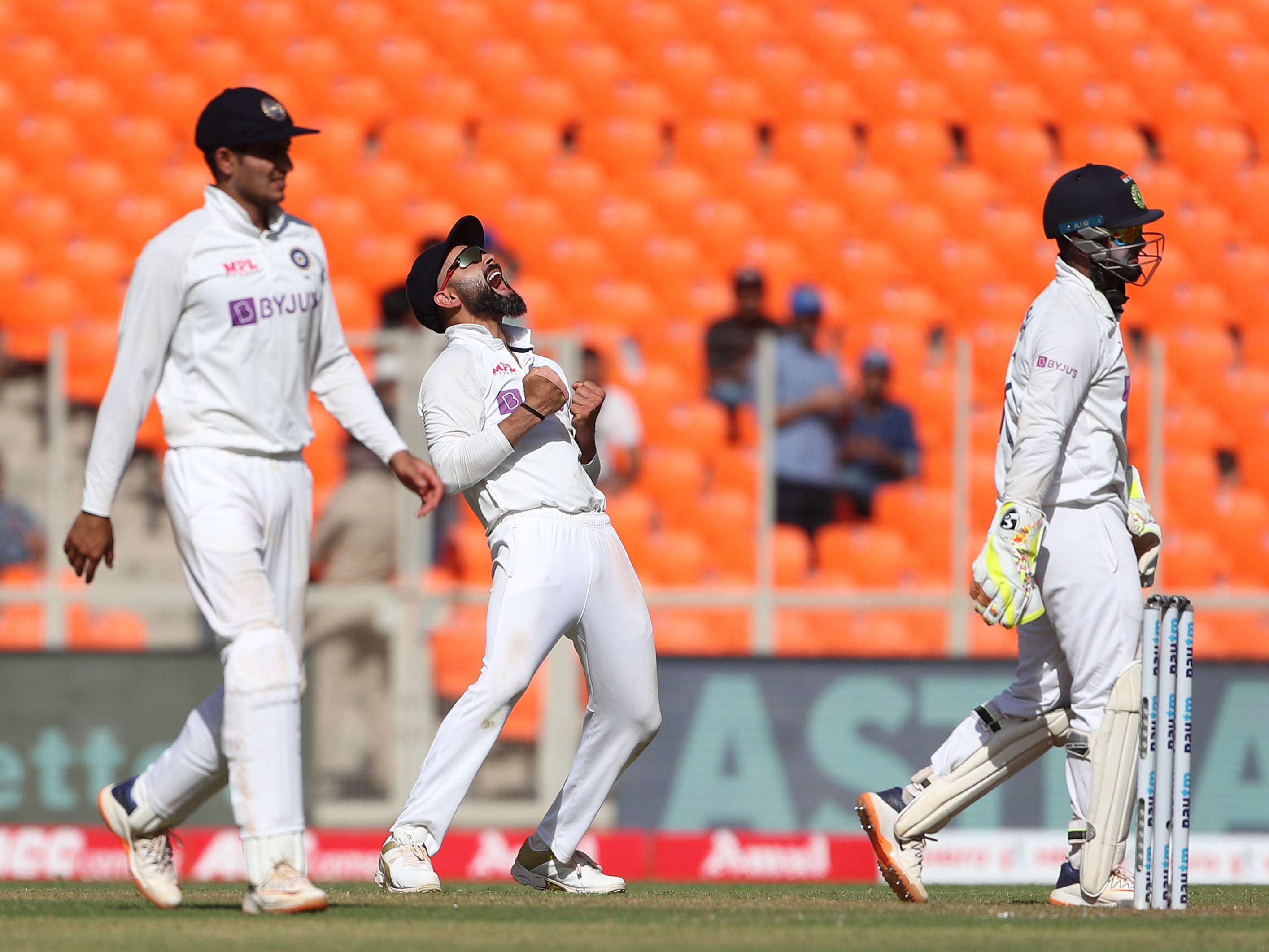 Virat Kohli celebrates on day one of the fourth Test