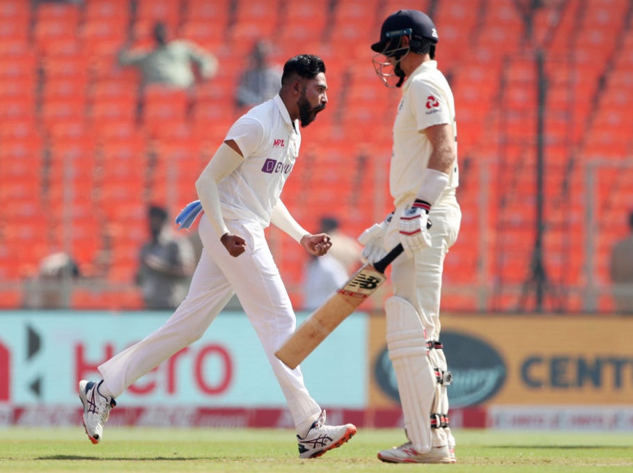 Mohammed Siraj takes the wicket of Joe Root