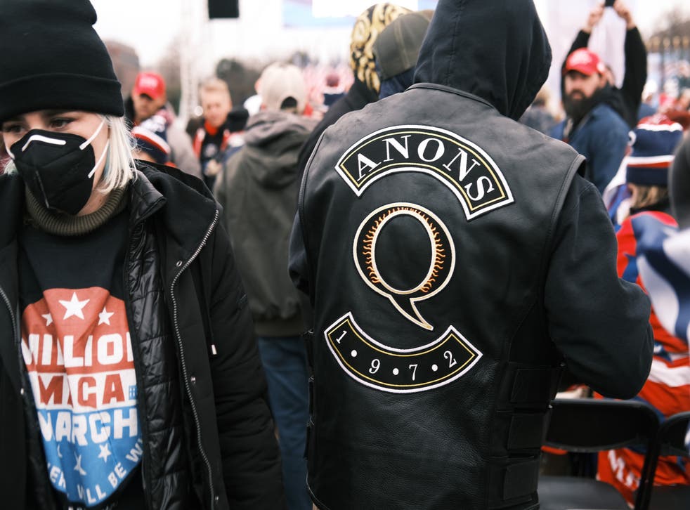 <p>QAnon is spreading damaging conspiracy theories targeting Chinese and Jewish people, experts say. File photo. </p>