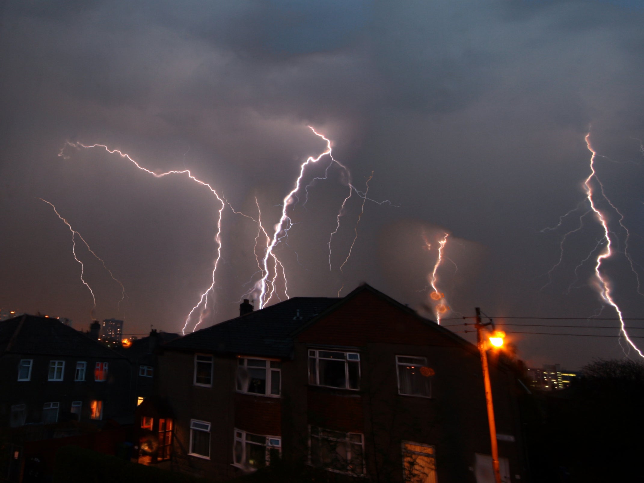 Multiple bolts of lightning flash in Glasgow during a thunderstorm