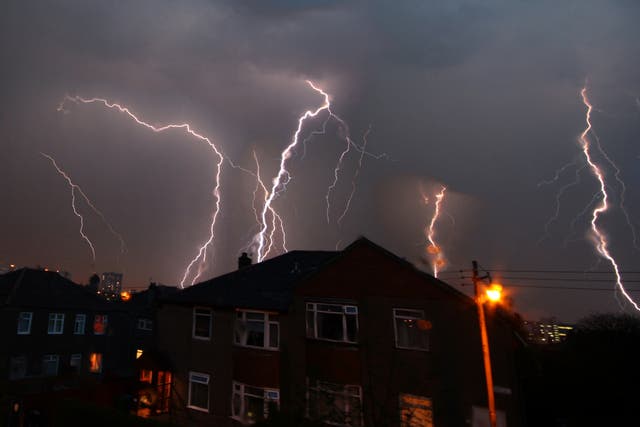 Multiple bolts of lightning flash in Glasgow during a thunderstorm