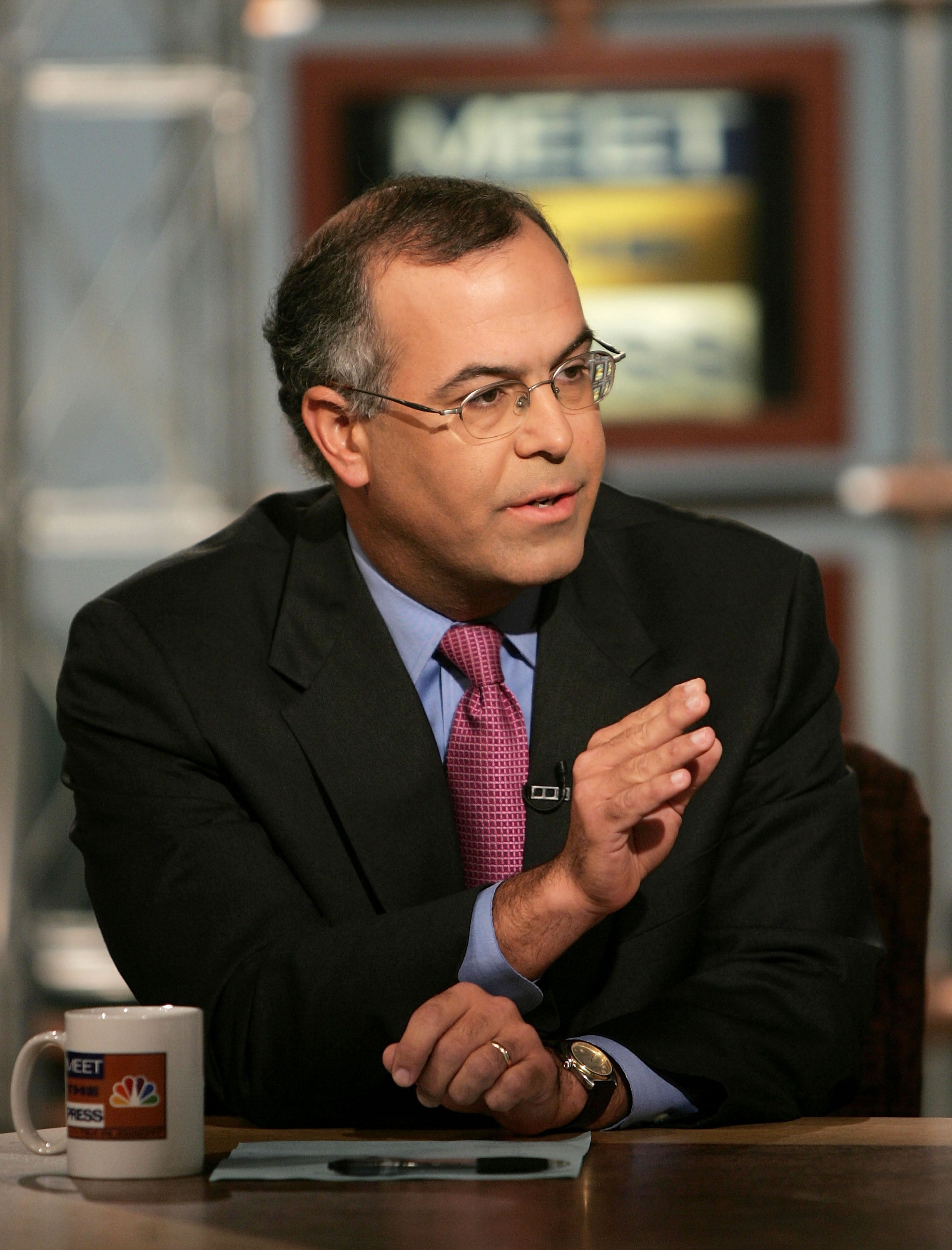 WASHINGTON - SEPTEMBER 25: New York Times columnist, David Brooks, gestures while speaking on NBC's "Meet the Press" during a taping at the NBC studios September 25, 2005 in Washington, DC.