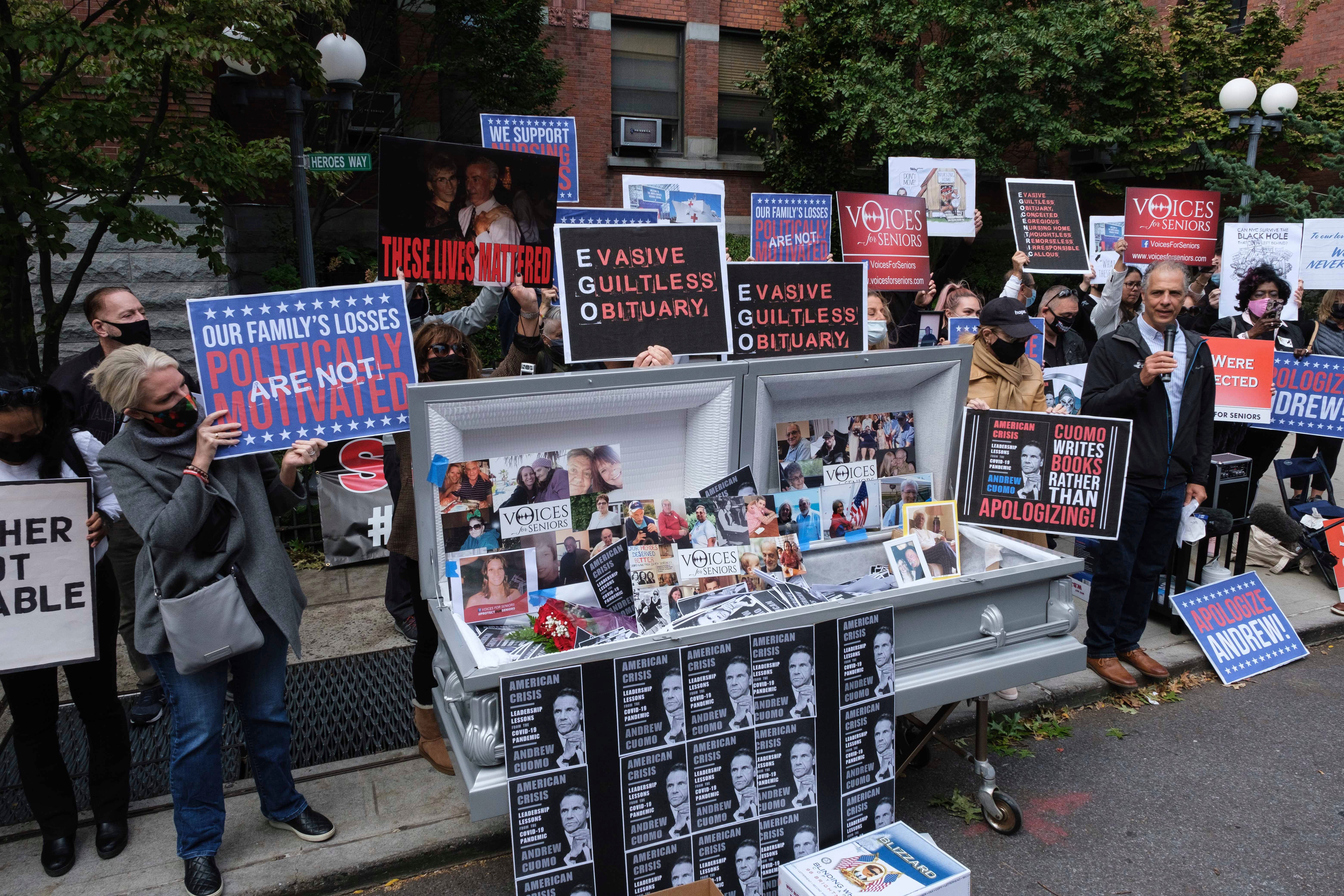 In this October 2020 photo, families of COVID-19 victims who passed away in New York nursing homes gather in front of the Cobble Hill Heath Center to demand that New York Gov. Andrew Cuomo apologize for his response to the coronavirus in nursing homes during the pandemic