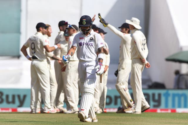 Virat Kohli of India walks back during day two of the fourth Test