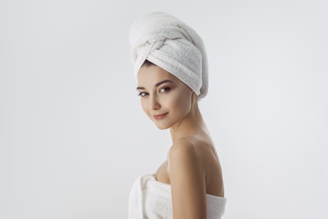 woman wearing white towel and turban