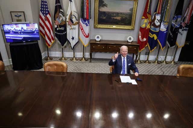 <p>Joe Biden gives a thumbs up as he speaks during a virtual call to congratulate Nasa on the successful Mars landing</p>