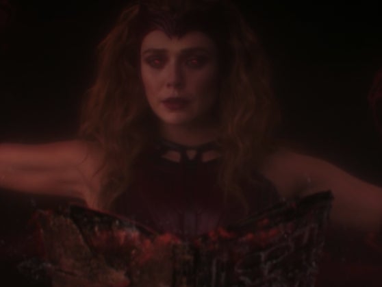 The Scarlet Witch (Elizabeth Olsen) reading the Darkhold in ‘WandaVision’
