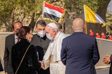 Pope Francis arrives in Iraq and calls for an end to divisions, amid huge security operation