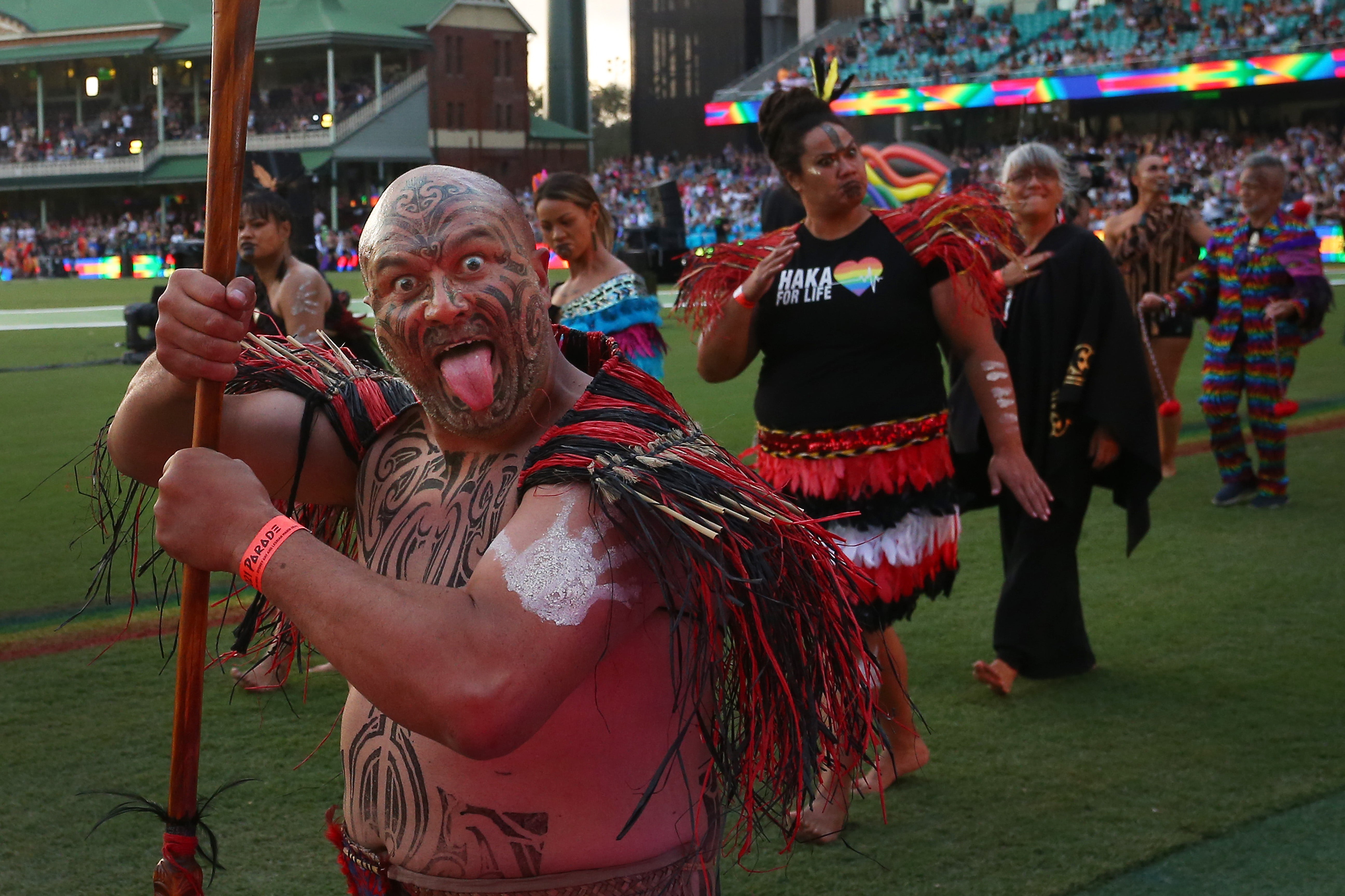 Parade goers take part in the 43rd Sydney Gay and Lesbian Mardi Gras Parade at the SCG