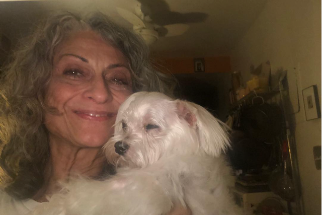 Janis Dardris with one of her dogs.