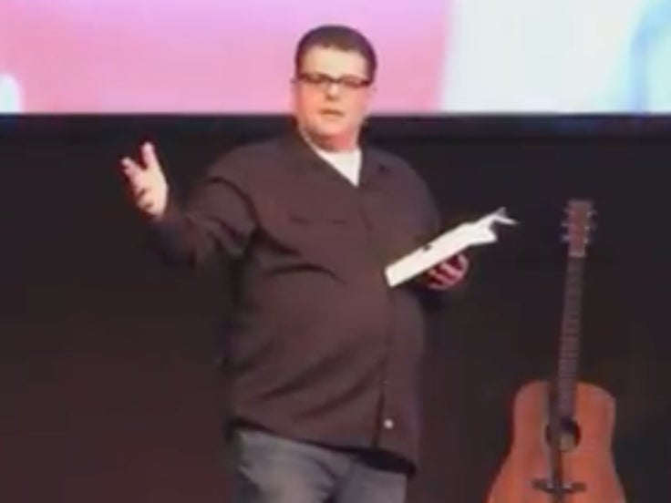 <p>Pastor Stewart-Allen Clark of the Malden First General Baptist Church during a service in February 2021</p>