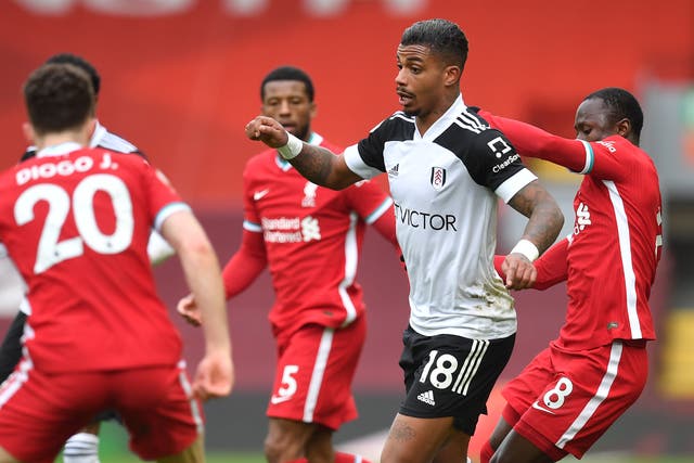 Fulham goalscorer Mario Lemina is surrounded by Liverpool players