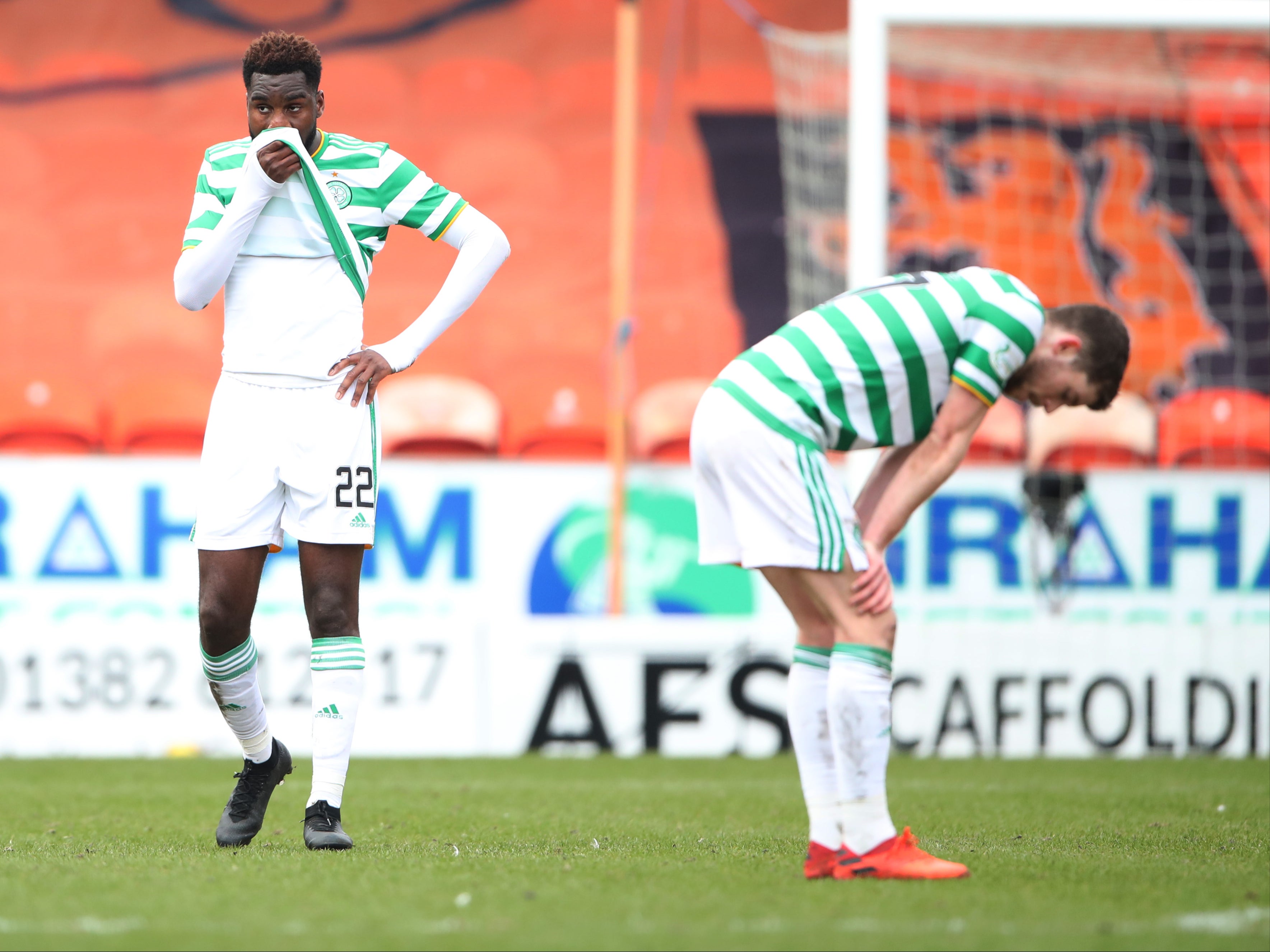 Celtic players react after drawing at Dundee United