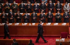 Hong Kong leader welcomes changes that would allow Beijing to vet city’s legislators