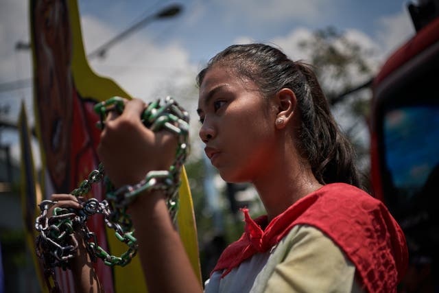 <p>Protesters march to mark International Women’s Day in Manila in the Philippines</p>